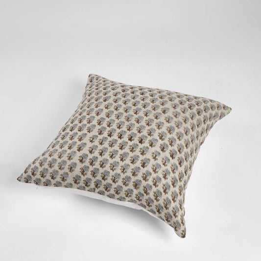 Decorative pillow with a subtle pattern on a white background