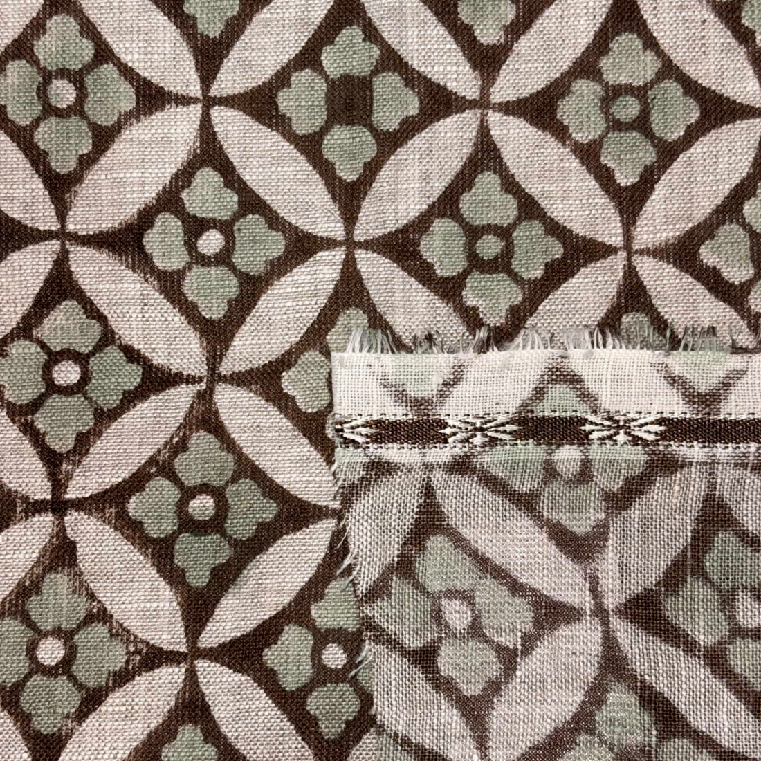 Close-up of fabric with a geometric pattern on a grey background