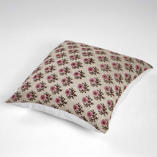 Floral patterned pillow on a white background