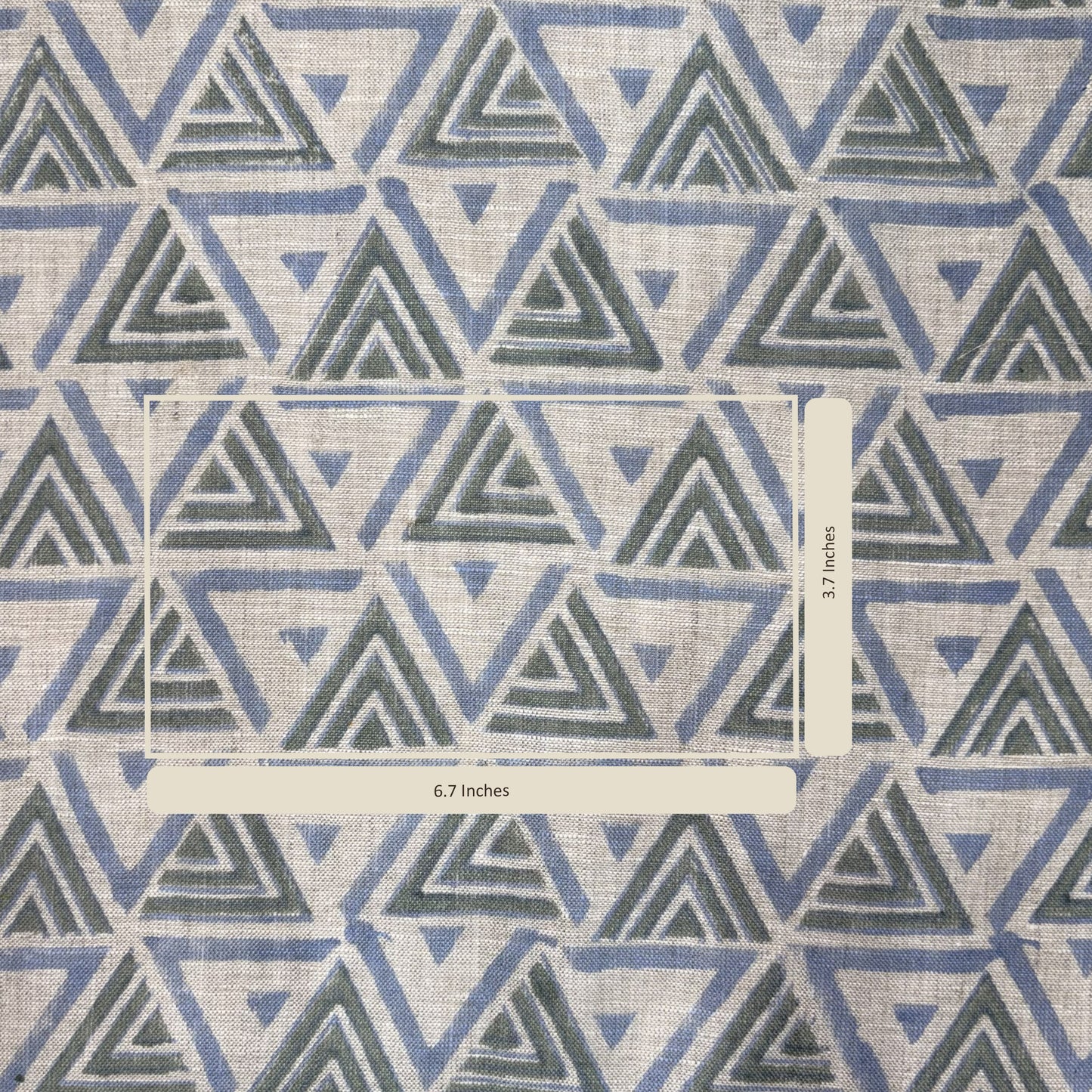 Fabric with geometric triangle pattern and measurement ruler