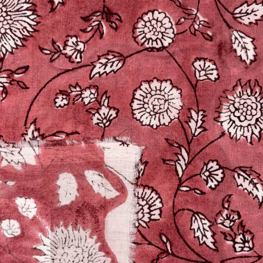 Red fabric with white floral pattern