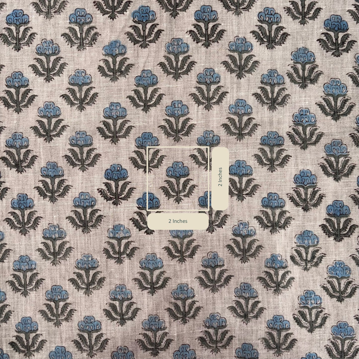 Fabric with a floral pattern on a grey background