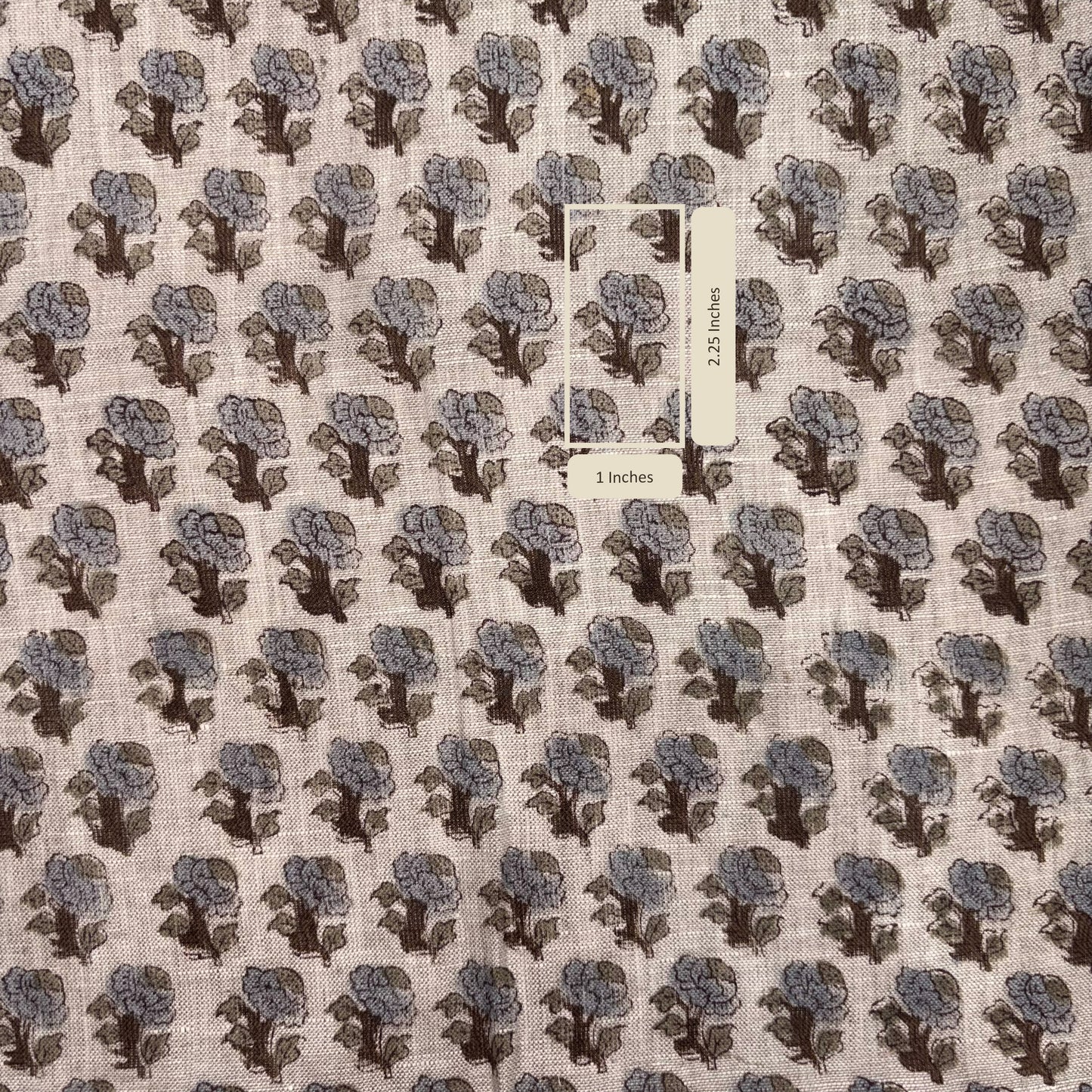 Fabric with a floral pattern and showing measurements.