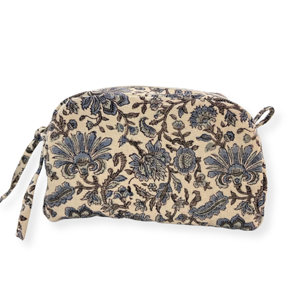 Floral patterned pouch with a strap on a white background