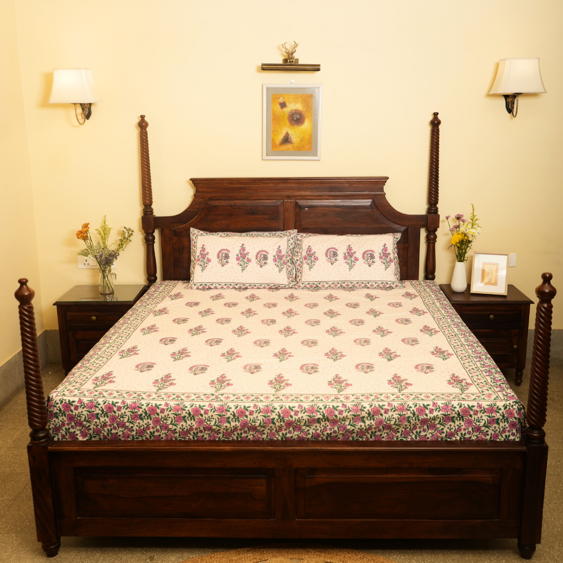 Wooden bed with floral bedding in a bedroom setting