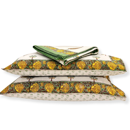 Set of decorative pillows with floral patterns on a white background