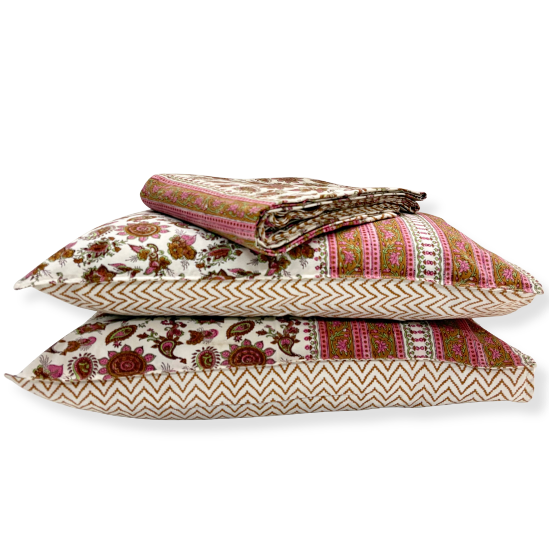 Stack of patterned pillows on a white background