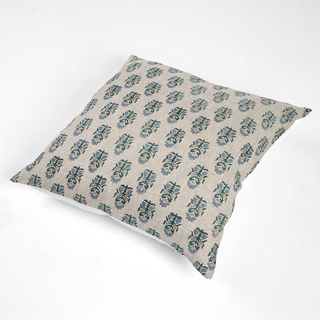 Decorative pillow with floral pattern on a white background