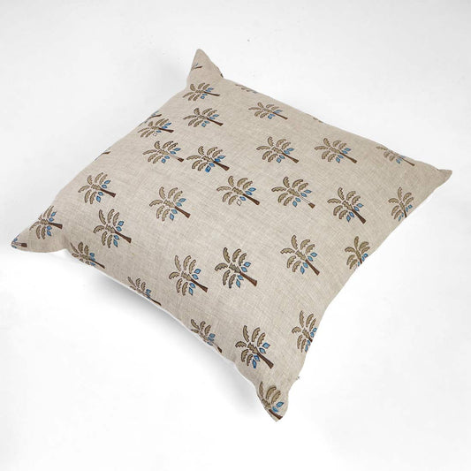 Decorative pillow with palm tree pattern on a white background