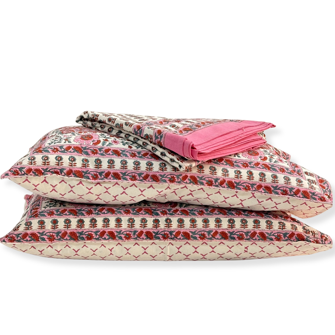 Stack of floral patterned pillows on a white background