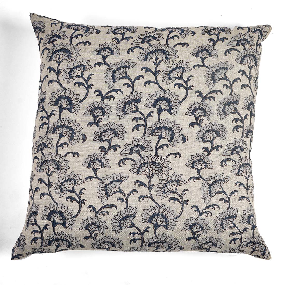 Decorative pillow with floral pattern on a white background