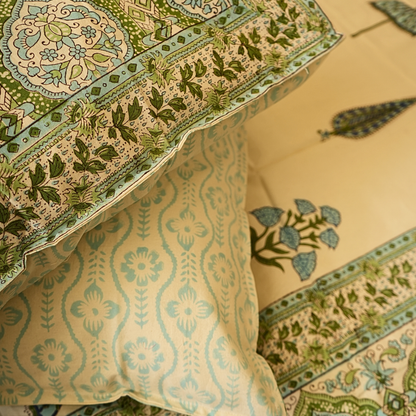 Close-up of patterned fabric with green and beige colors
