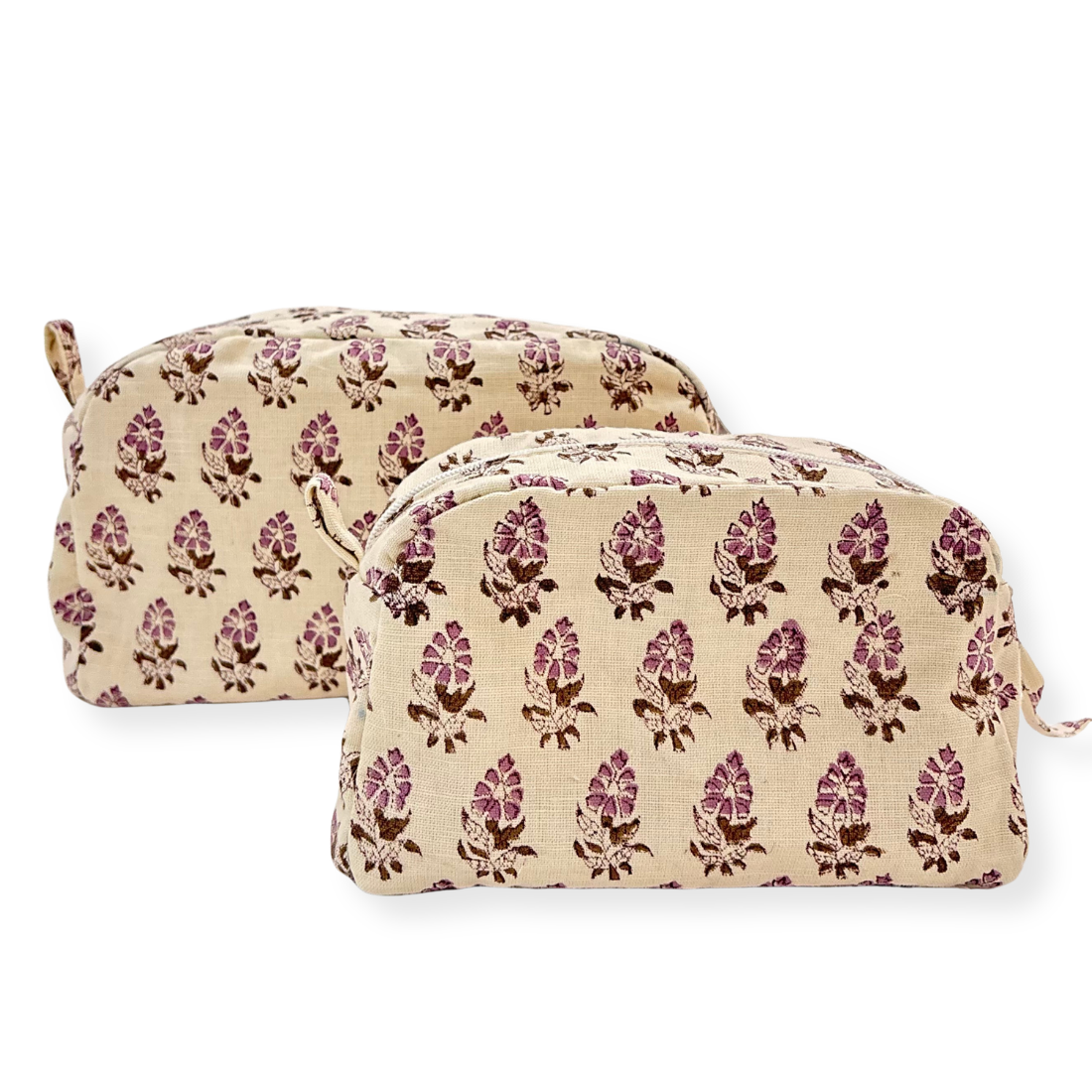Two floral-patterned pouches on a white background
