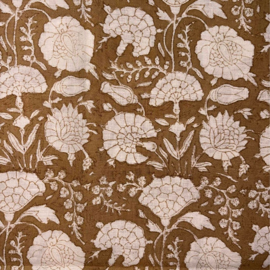 Floral pattern on fabric with beige flowers on a beige background