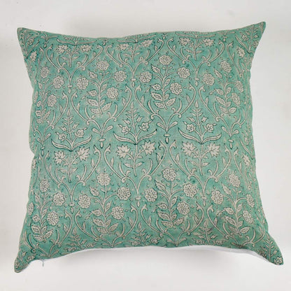 Decorative pillow with floral pattern on a white background