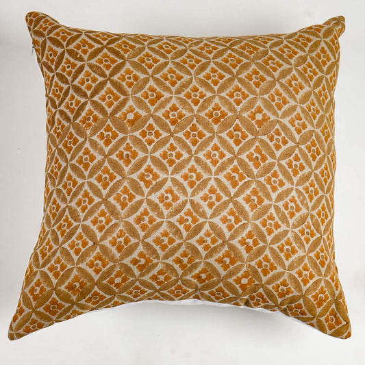 Decorative pillow with geometric pattern on a yellow background