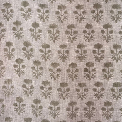 Textile pattern with brown floral design on a grey background