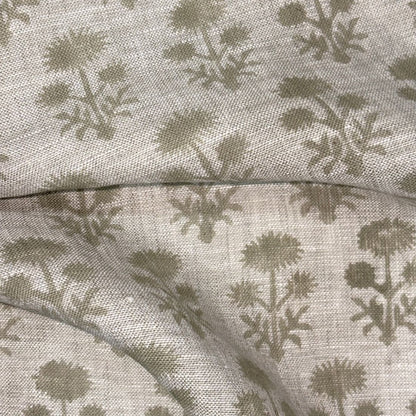 Fabric with a subtle floral pattern on a neutral background