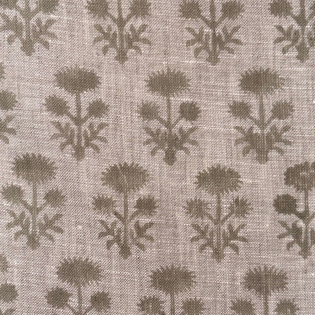 Textile pattern with dark green leaves on a grey background