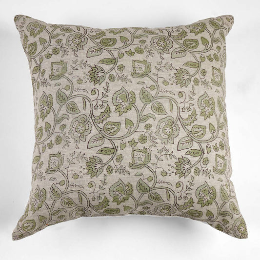 Decorative pillow with green floral pattern on a white background
