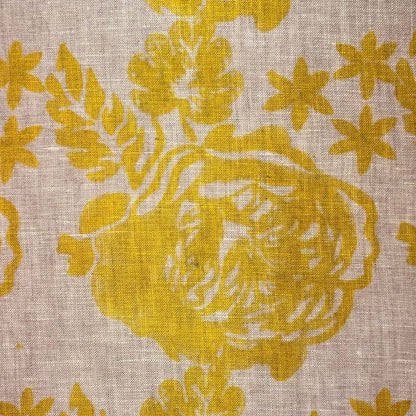 Yellow floral pattern on grey fabric