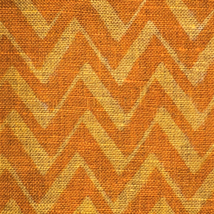 Textured orange and yellow patterned fabric