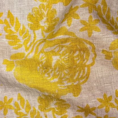 Close-up of yellow floral pattern on grey fabric