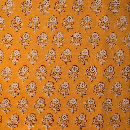 Yellow fabric with small floral pattern