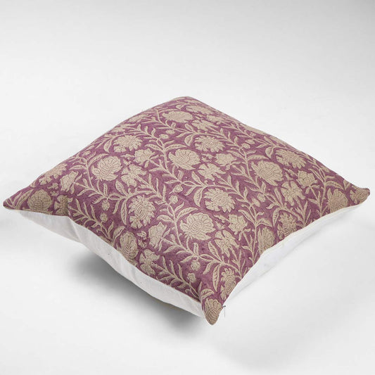 Decorative pillow with floral pattern on a pink background