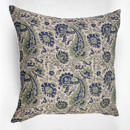 Decorative pillow with paisley pattern on a white background