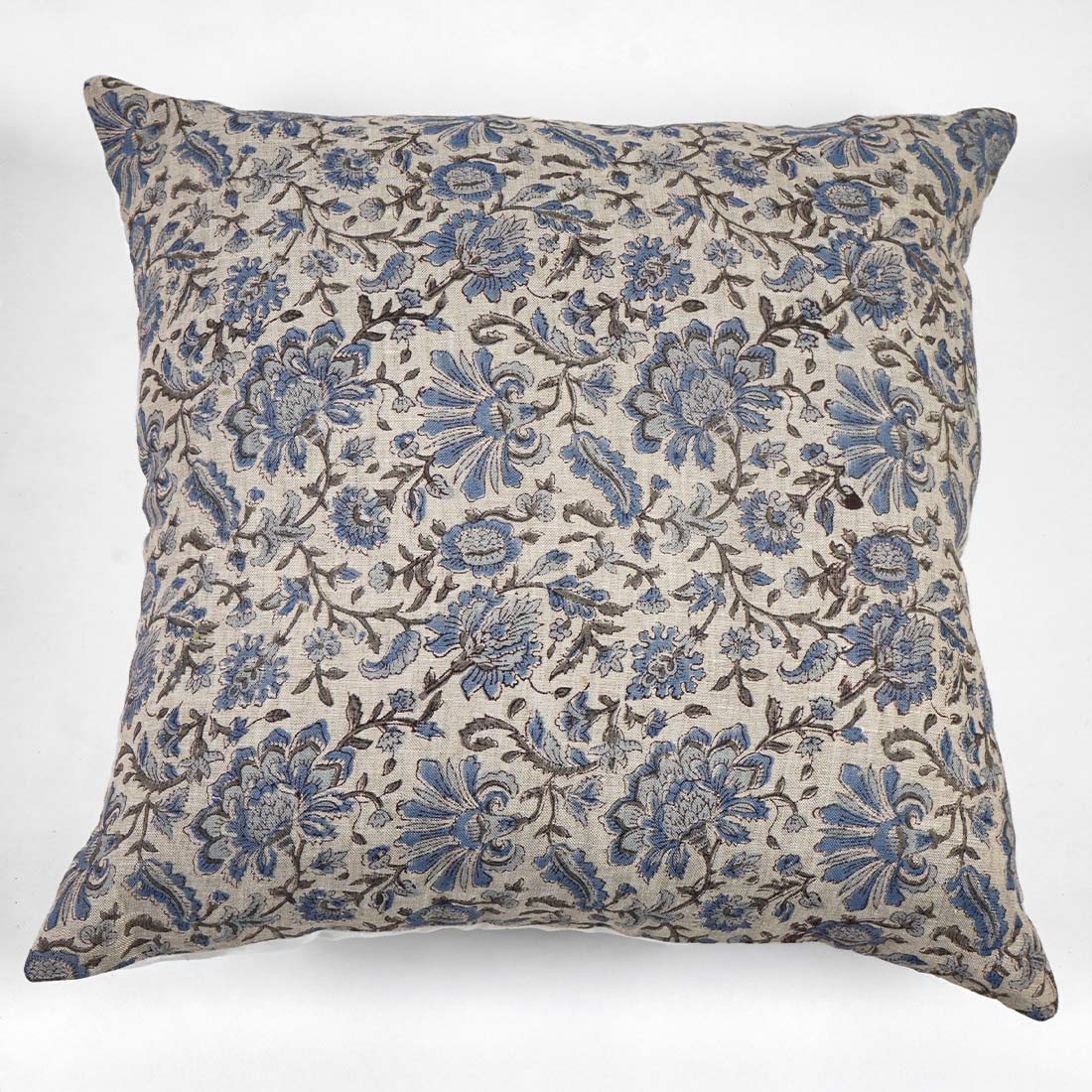 Floral patterned pillow on a white background