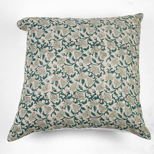 Decorative pillow with green and grey floral pattern on a white background