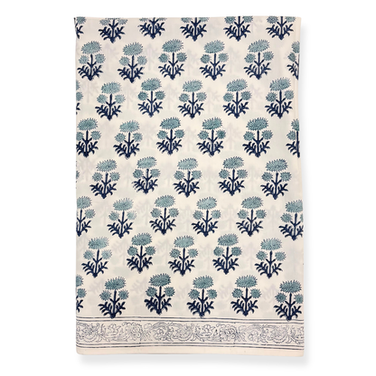 Tablecloth with blue floral pattern on a white background