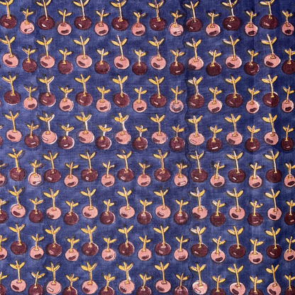 Pattern of small plants on a blue fabric background