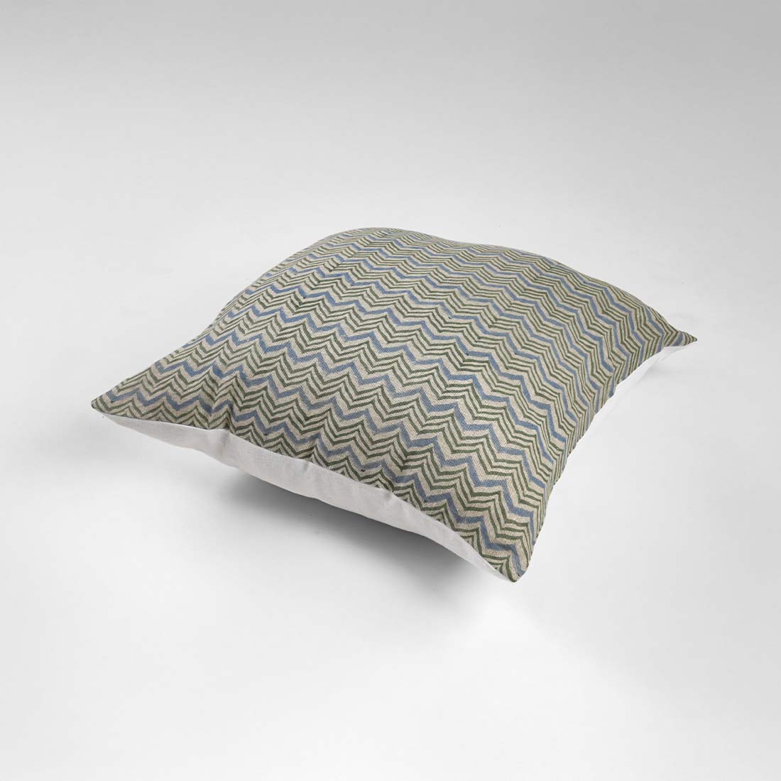 Decorative pillow with a geometric pattern on a white background