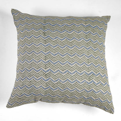 Decorative pillow with zigzag pattern on a white background
