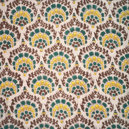 Patterned fabric with green, yellow, and brown colors on a grey background