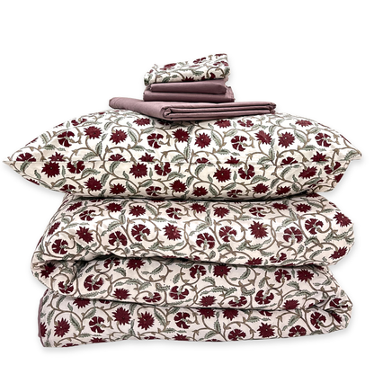 Floral patterned bedding set on a white background