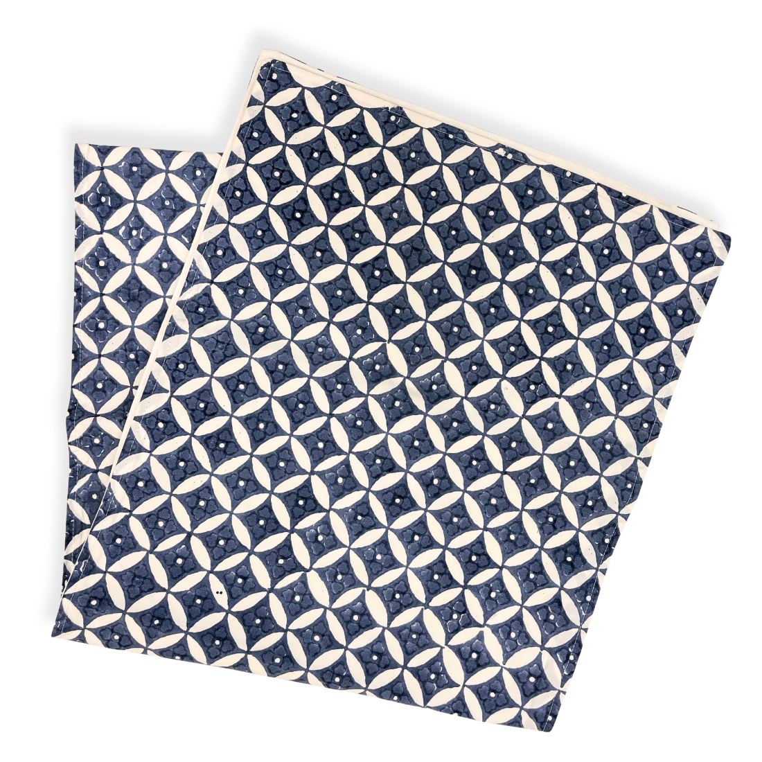 Blue and white patterned table runner on a white background