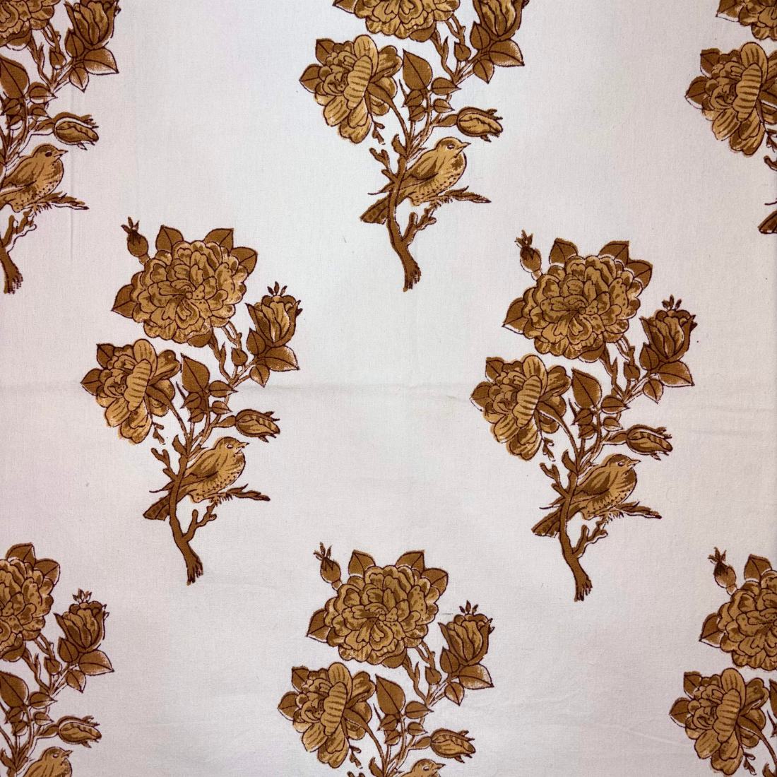 Brown floral and bird pattern on a white background