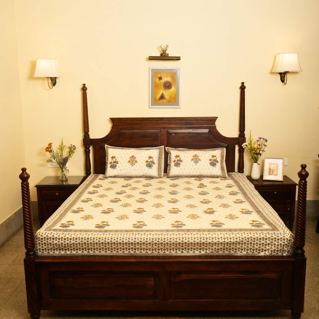 Wooden bed with floral patterns in a bedroom setting