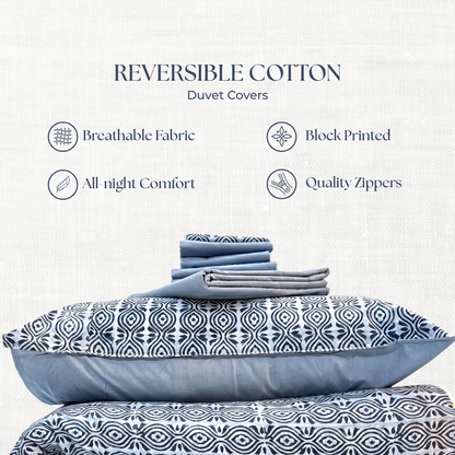 Reversible cotton duvet covers with geometric pattern on a white background
