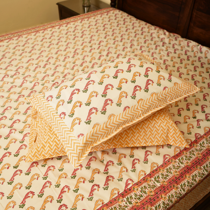 Patterned fabric with a chevron design on a bed