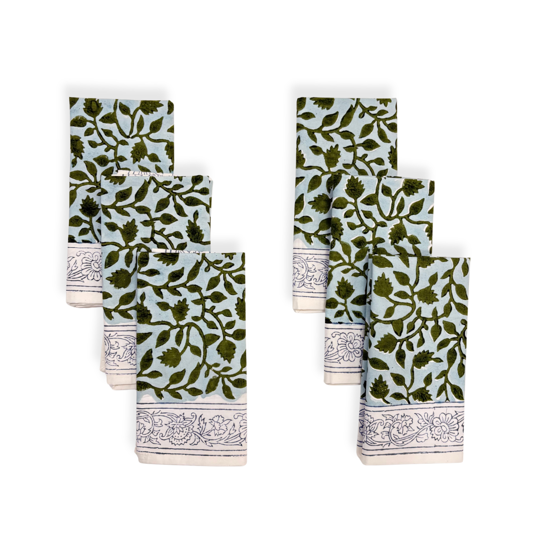 Set of six green and white patterned napkin on a white background
