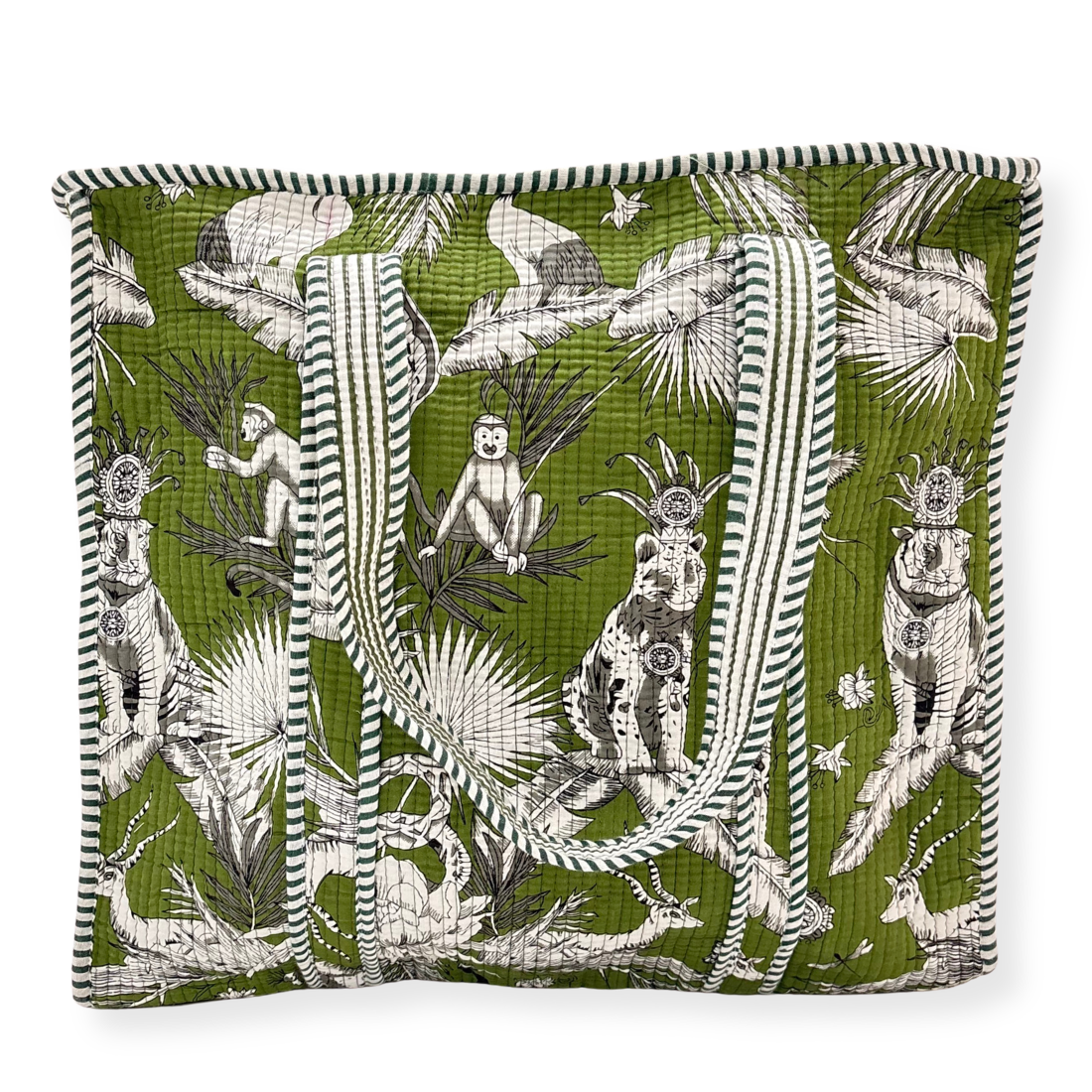 Decorative tote bag with a green background and black and white animal and plant pattern.