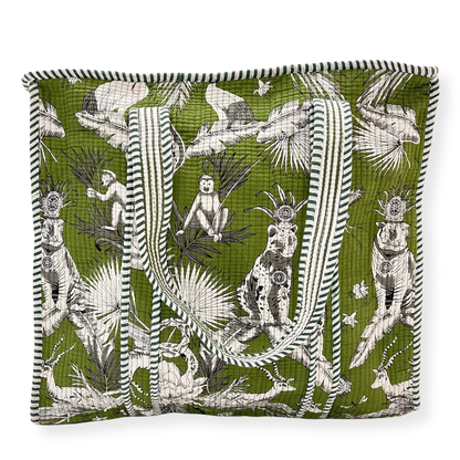 Decorative tote bag with a green background and black and white animal and plant pattern.