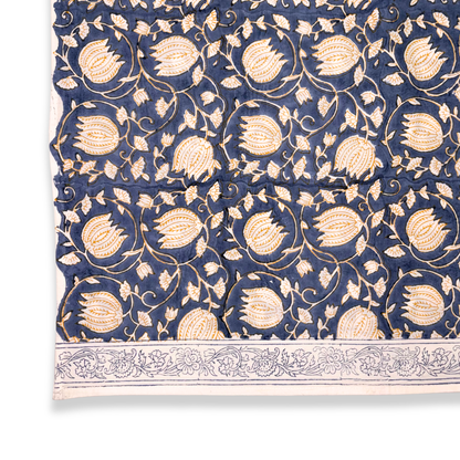 Navy blue tablecloth with gold floral pattern