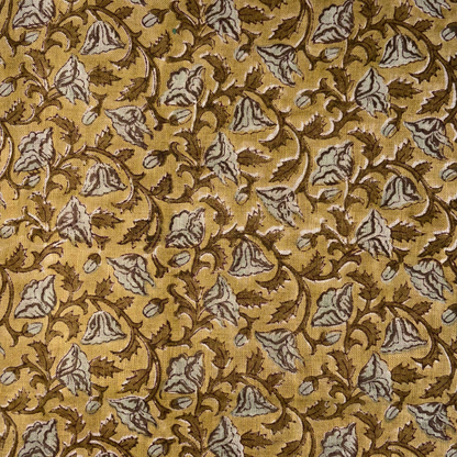 Patterned fabric with brown and beige design on a yellow background