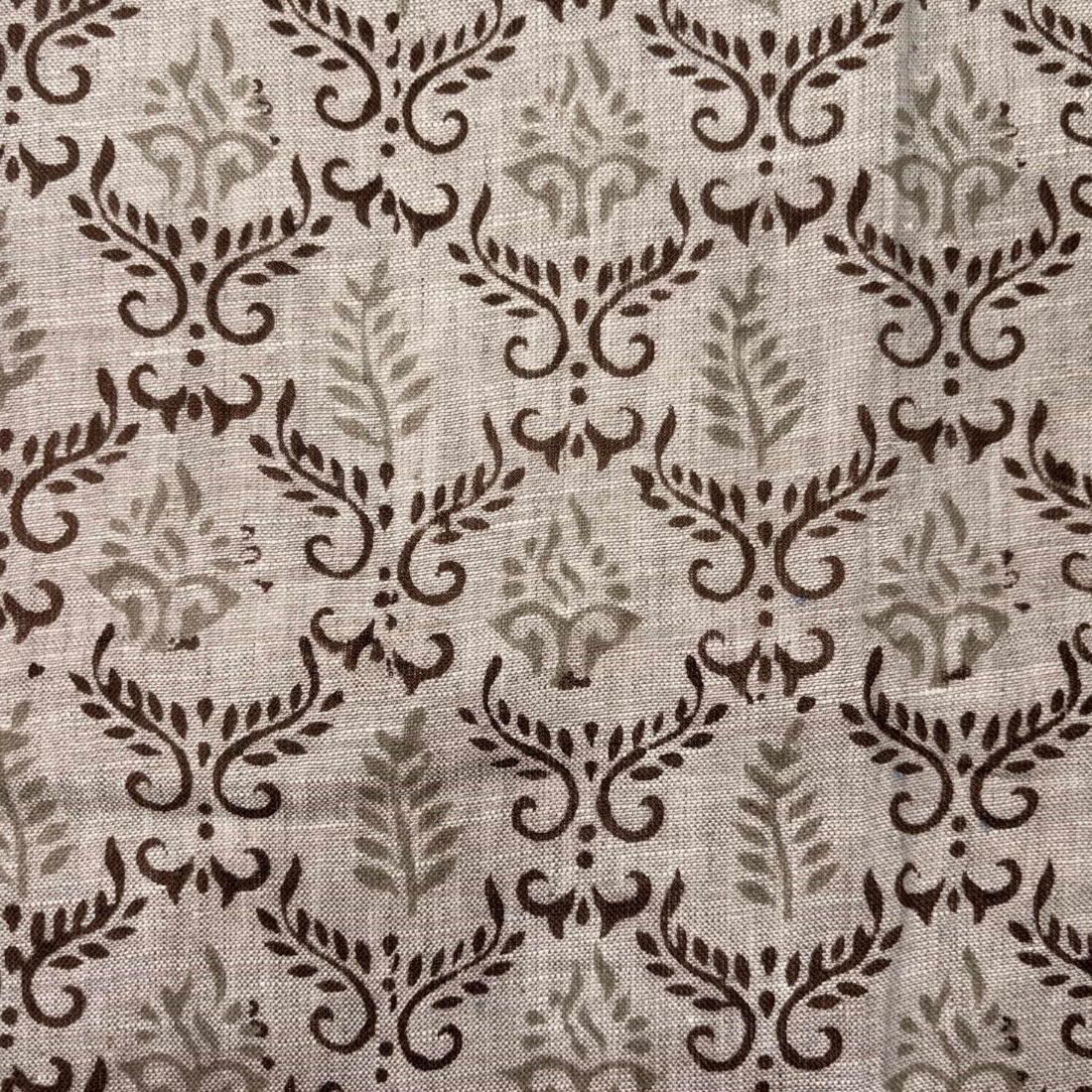 Brown floral pattern on grey fabric