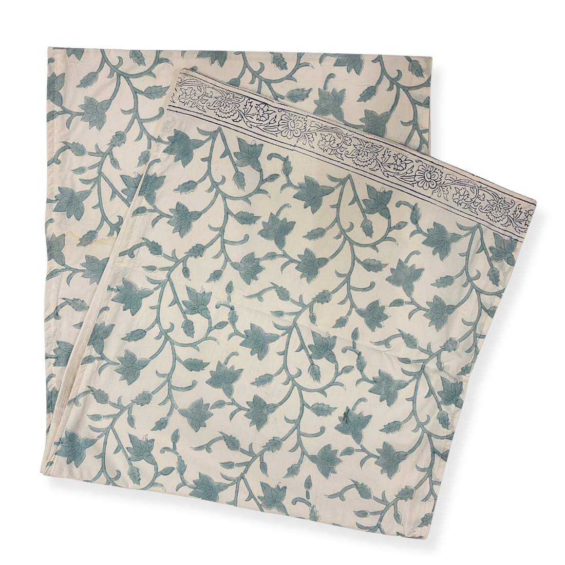Folded fabric with floral pattern on a white background
